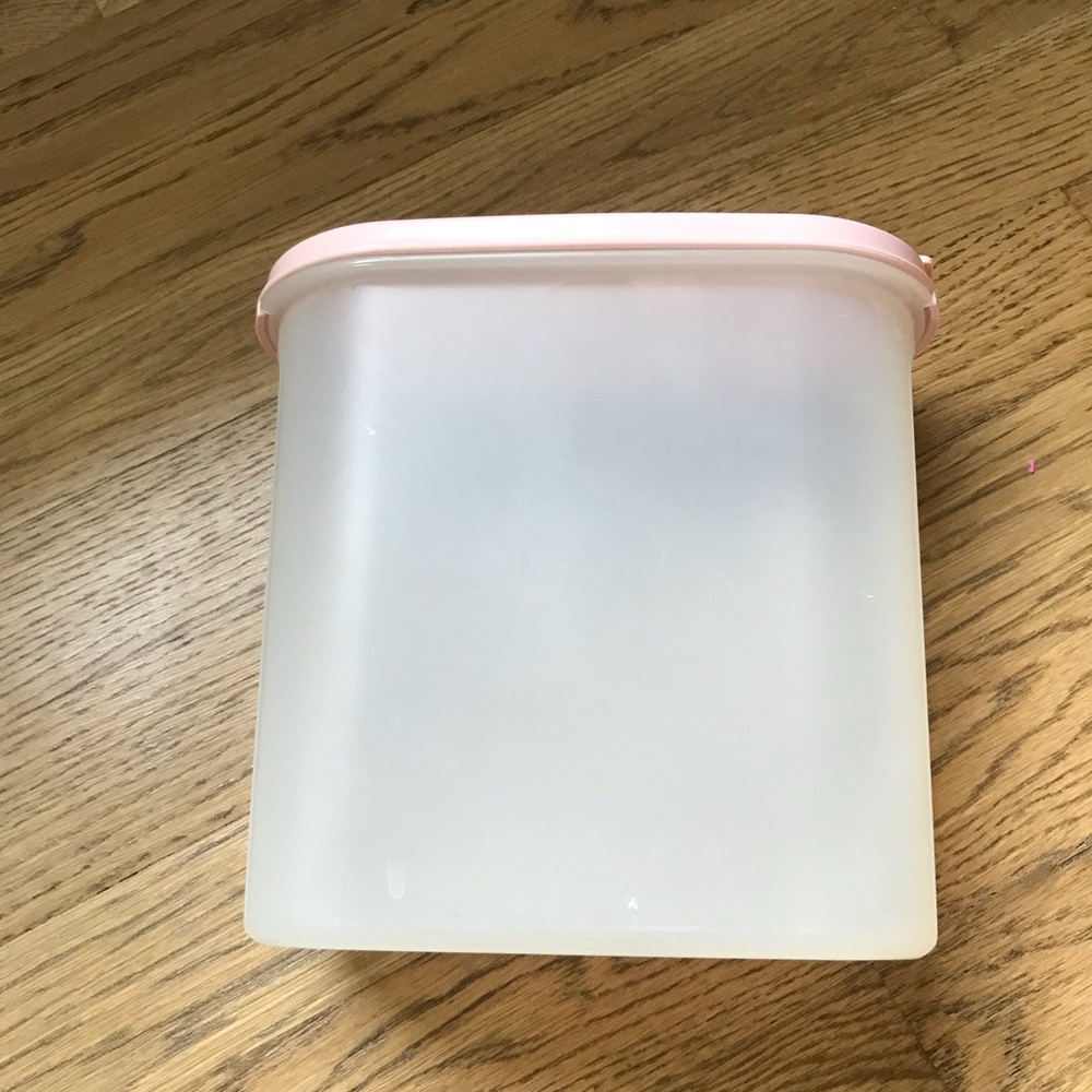 Tupperware vintage modular mates storage container with lid that flips open.